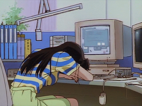 woman head down on a pc, with dangling mouse