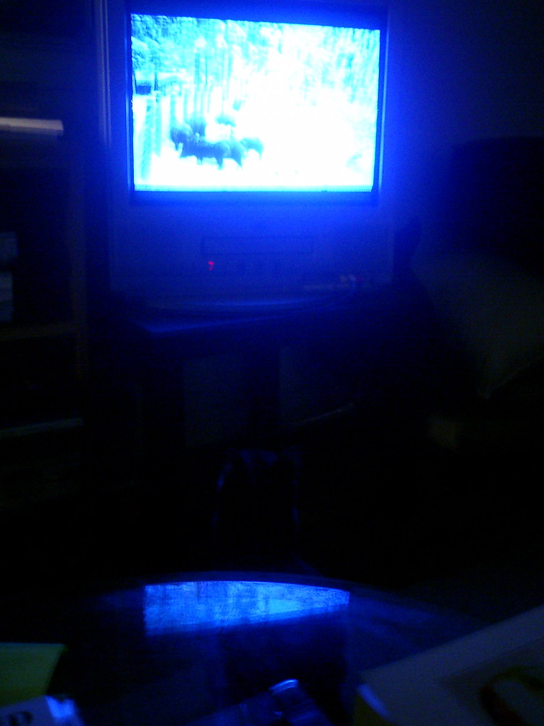 A CRT TV in a dark living room